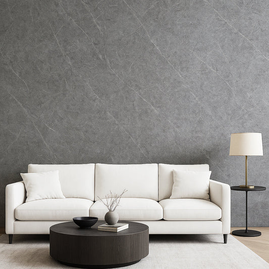 Matte faux stone wall panels behind white couch