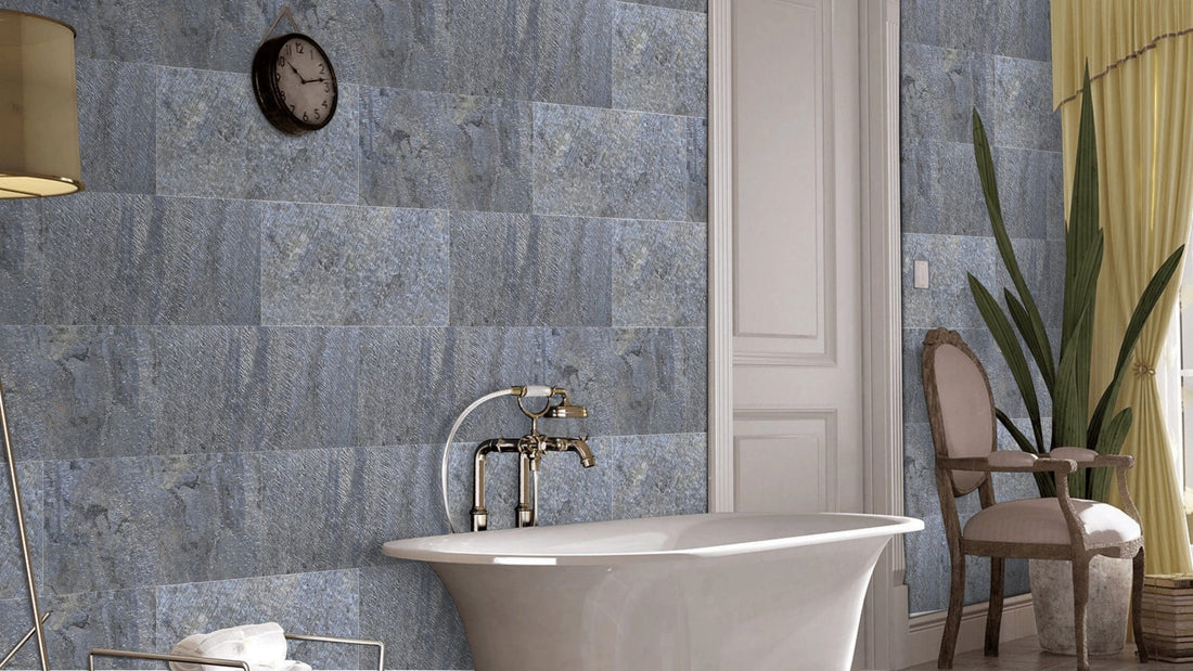 Elegant bathroom with freestanding tub and stone tiles.