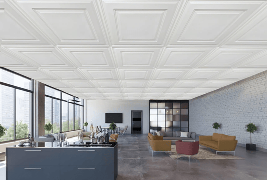 open area with decorative ceiling tiles