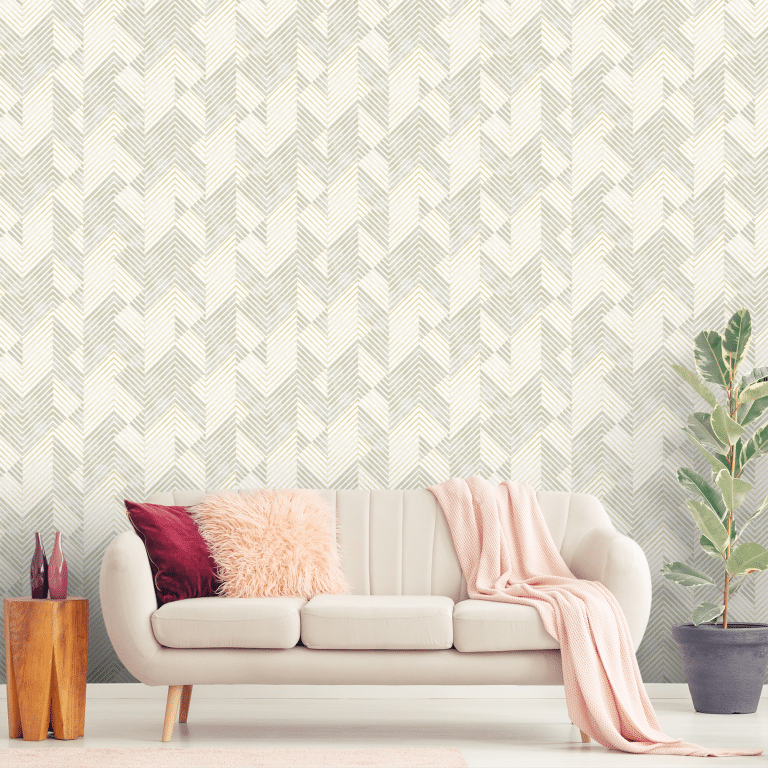 sofa with textured wallpaper behind